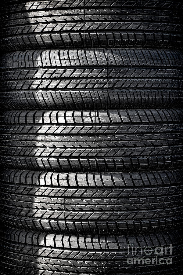 Tire Tower Photograph by Olivier Le Queinec