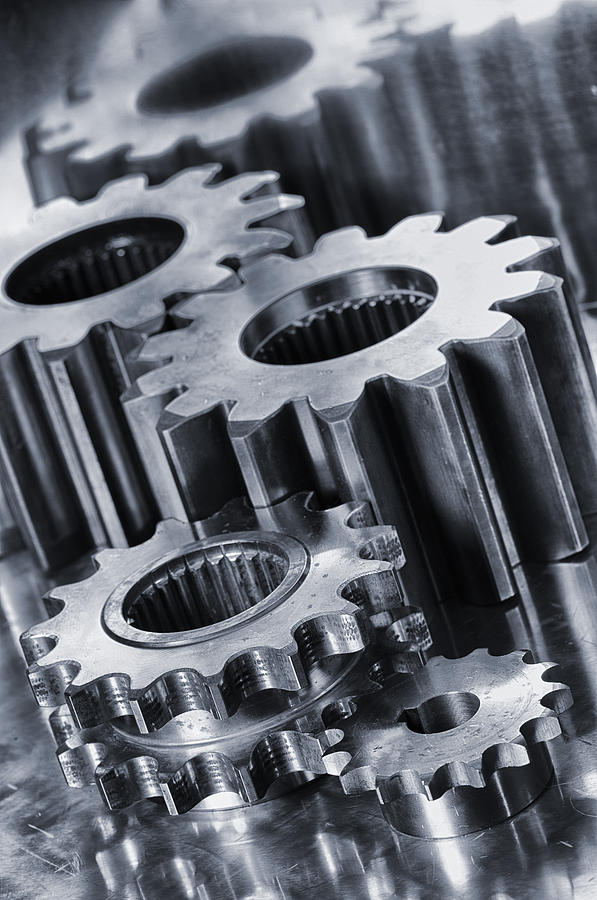 Titanium Gears And Cogs Photograph by Christian Lagereek