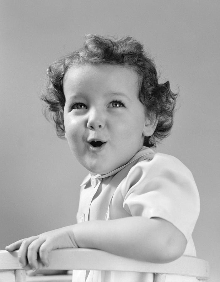 Toddler Looking Over Shoulder Photograph by H. Armstrong Roberts ...