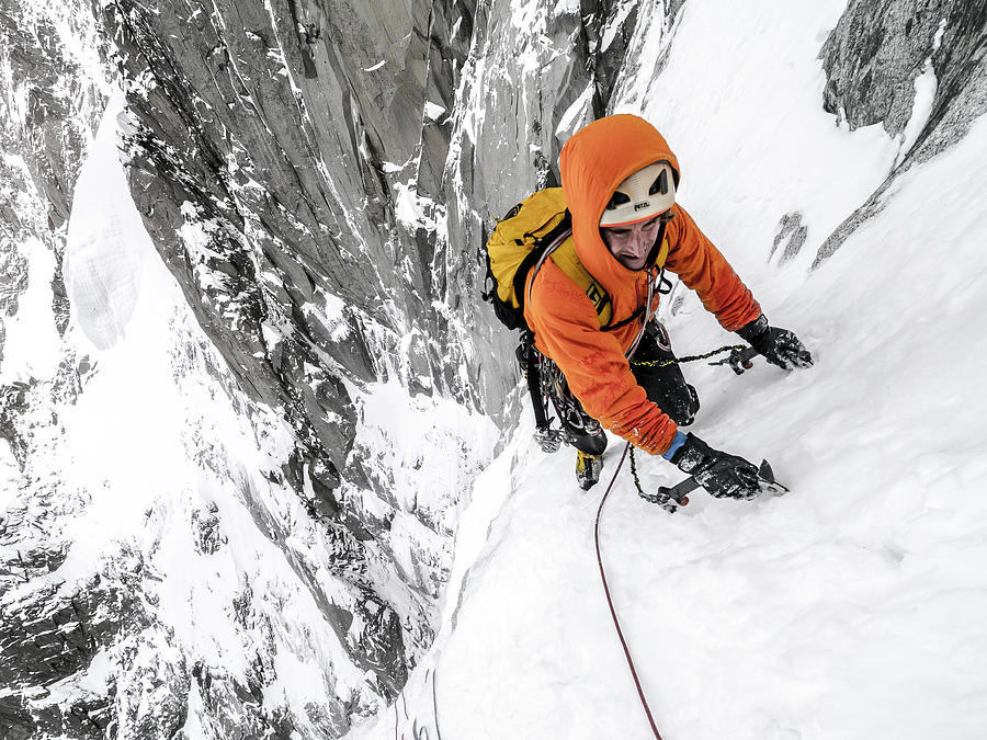 Tom Grant Arriving In The Upper Couloir Nord Des Drus, Chamonix, France Photograph by Ben Tibbetts