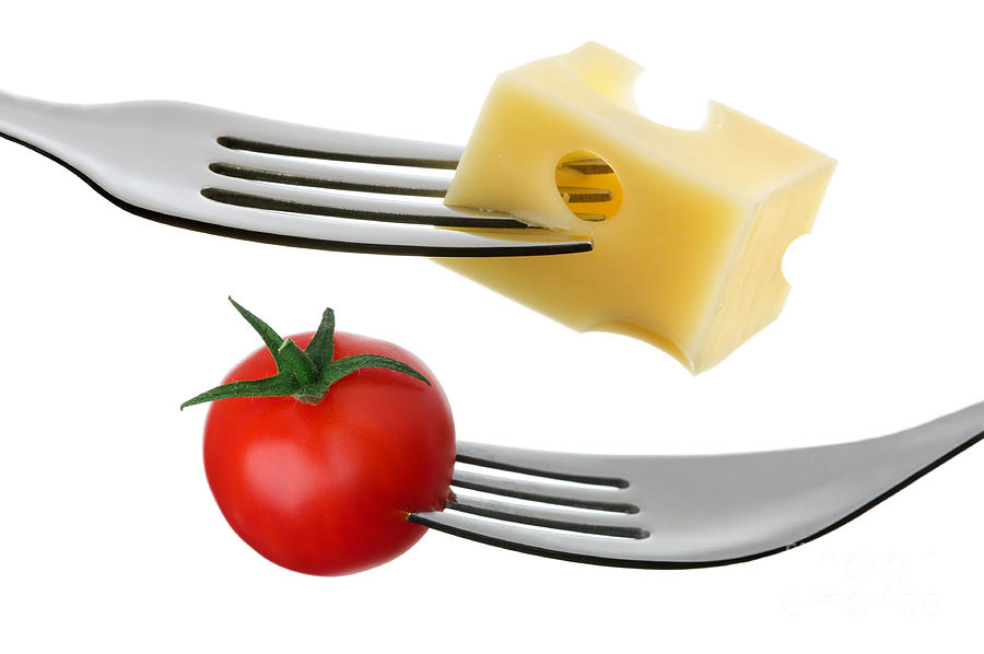 Tomato And Cheese On A Fork Against White Background Photograph by Lee Avison