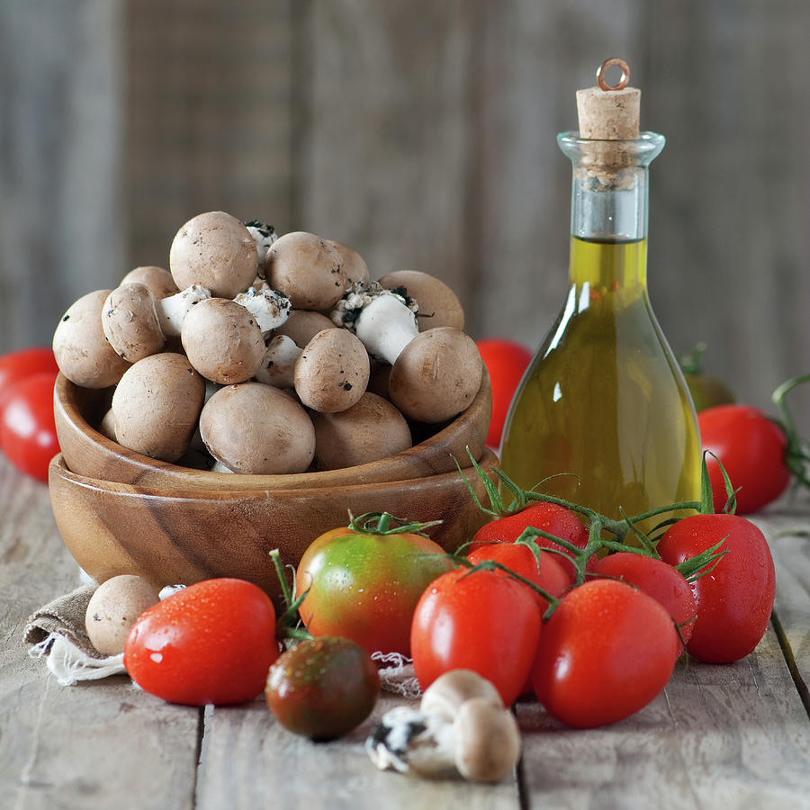 Tomato And Mushrooms Photograph by Oxana Denezhkina