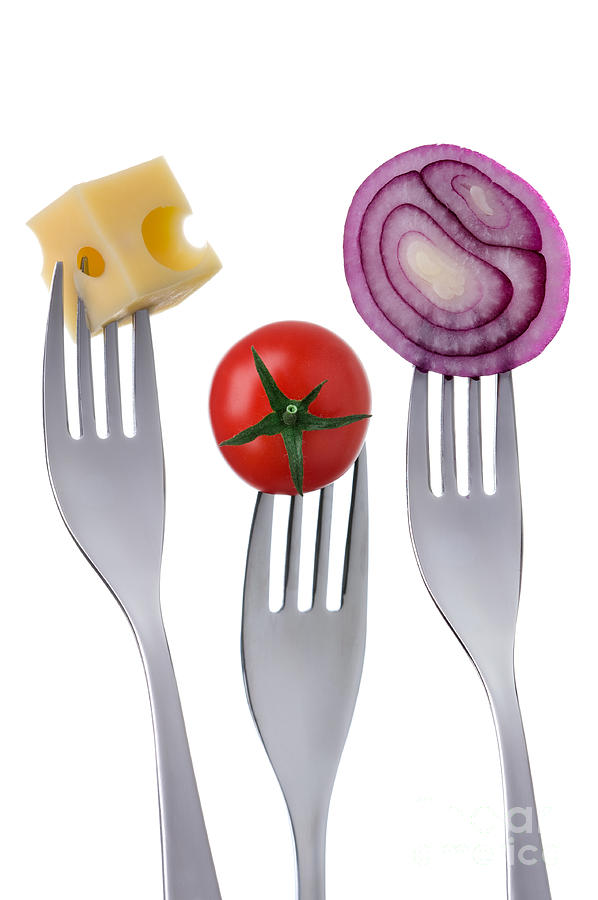 Tomato Cheese And Onion On Forks Against White Background Photograph by Lee Avison
