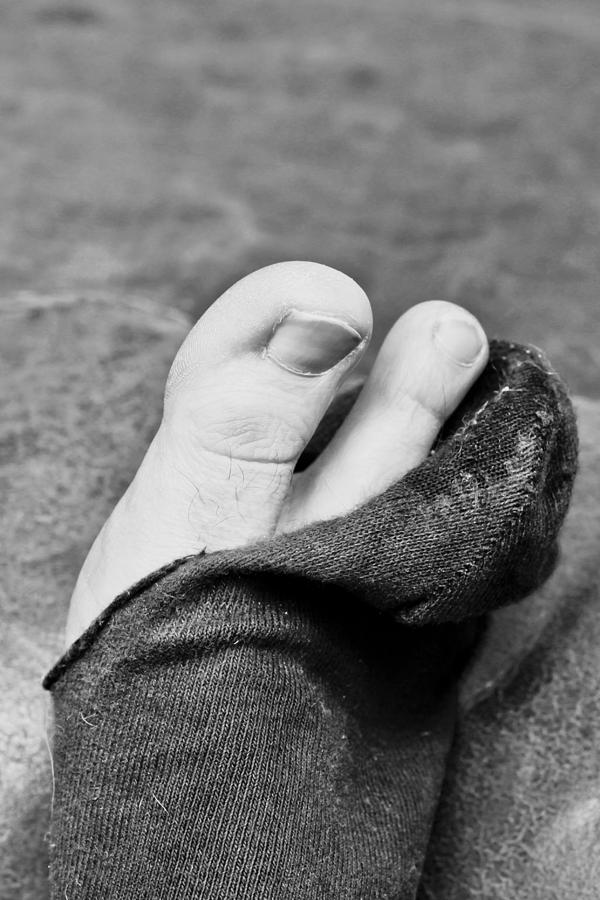 Black Photograph - Torn sock by Tom Gowanlock