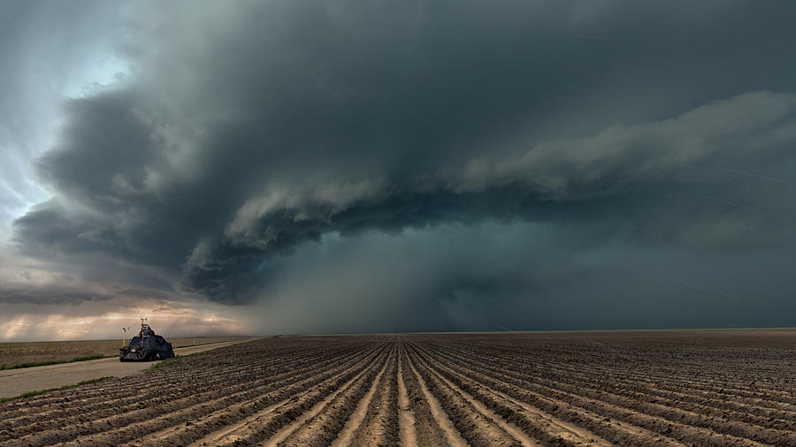 Tornado Intercept Vehicle with a severe thunderstorm, Colorado. USA Photograph by John Finney Photography