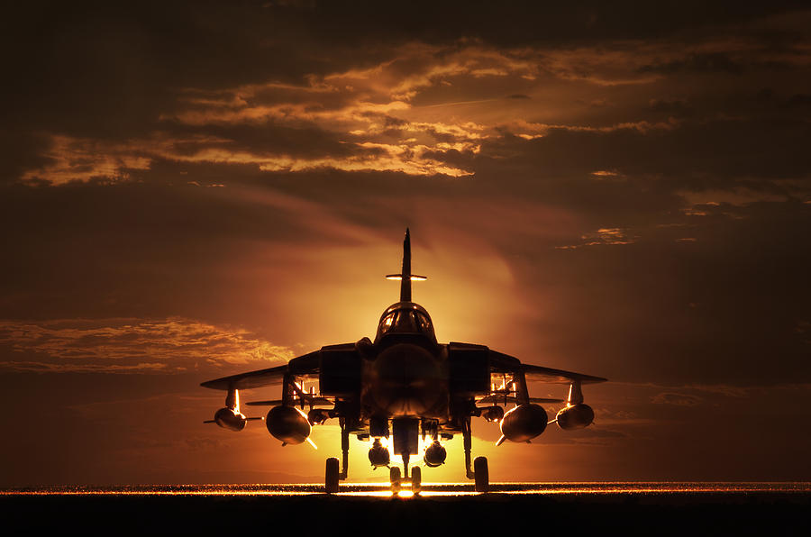 Tornado war plane, silhouette, sunset Photograph by Don Farrall