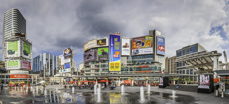 Toronto Yonge Dundas Square crowds fountains colourful billboards panorama Canada Photograph by fotoVoyager