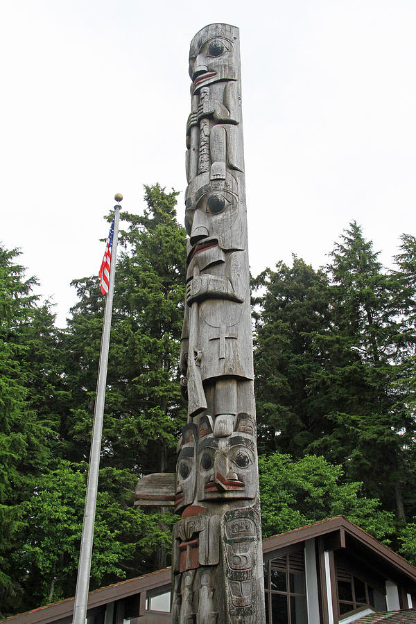 Totem And Flag Photograph