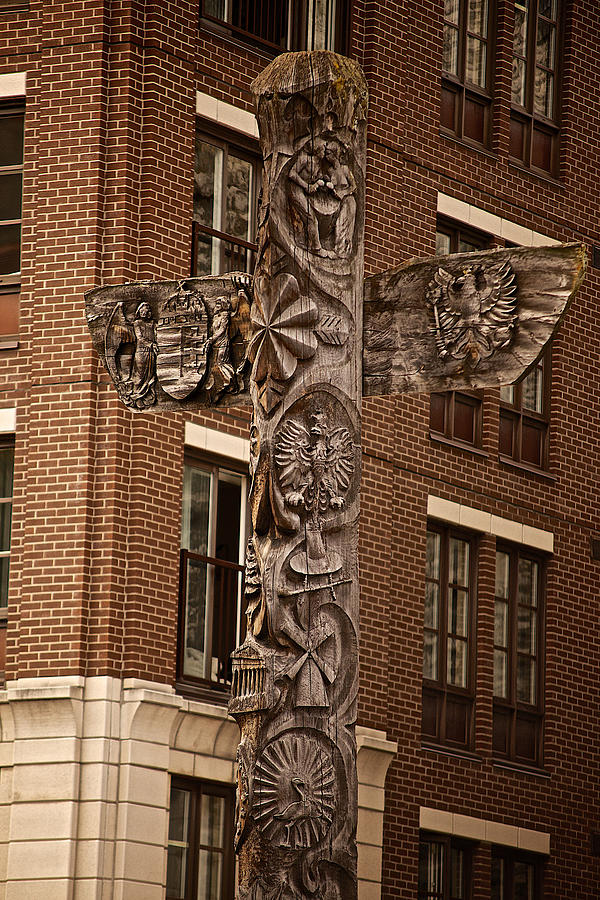 Totem pole Photograph by Prince Andre Faubert
