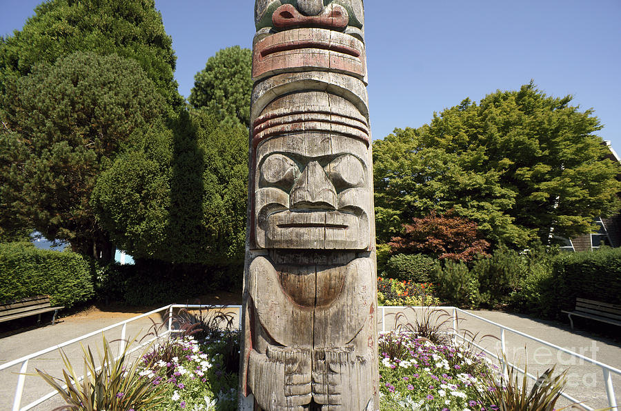 Totem Pole Face Vancouver Photograph by John  Mitchell