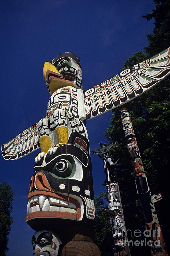 Totem pole park in Stanley Park  Vancouver British Columbia Cana Photograph by Jim Corwin
