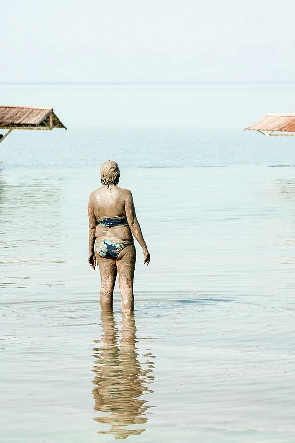 Tourist In The Dead-sea Photograph by Science Photo Library Tourist In The Dead-sea Photograph by Science Photo Library
