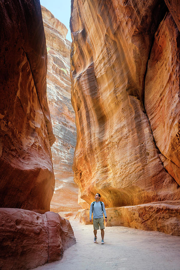 Nature Photograph - Tourist Walking Through Al Siq Canyon by Leslie Parrott