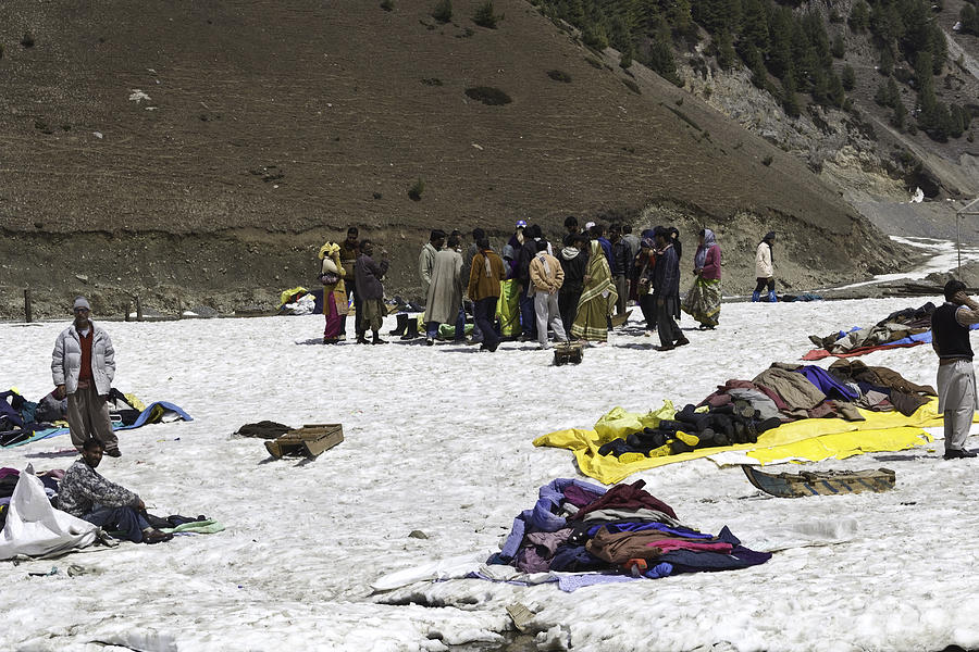 Boot Photograph - Tourists and locals mingling in the glacier like environment by Ashish Agarwal