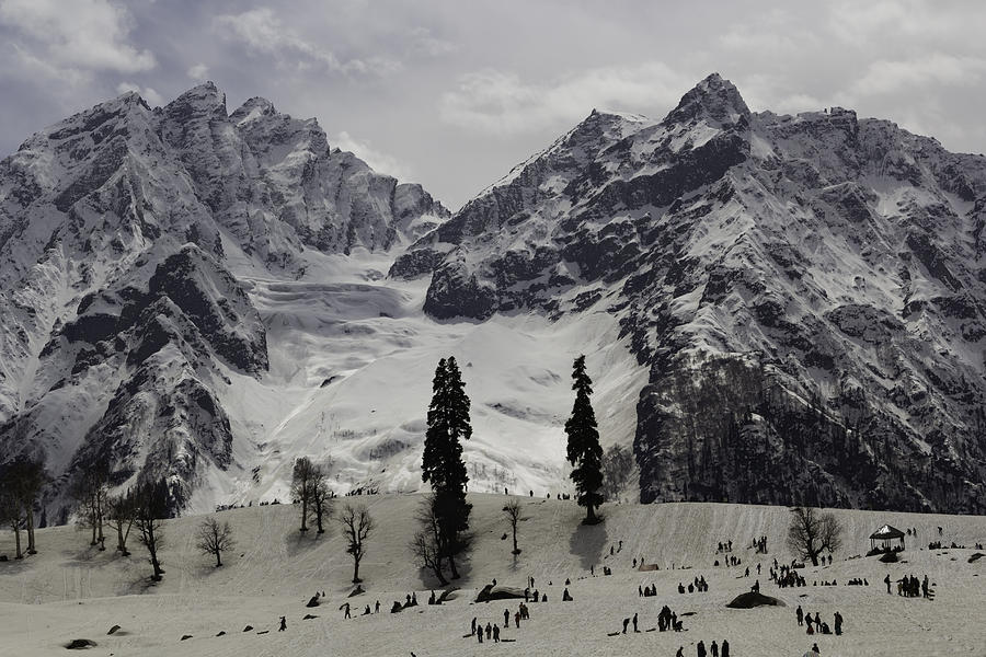 Tourists and locals on the snow and ice covered slope in Sonmarg Photograph by Ashish Agarwal