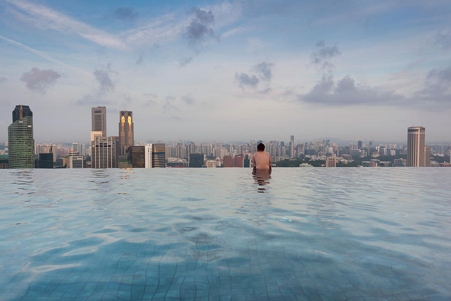 Tourists At Infinity Pool Of Marina Bay Photograph by Panoramic Images ...