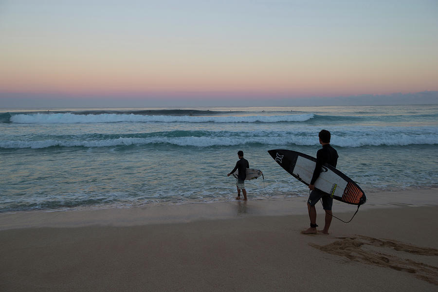 Tourists Carrying Surfboards On Beach Photograph by Panoramic Images