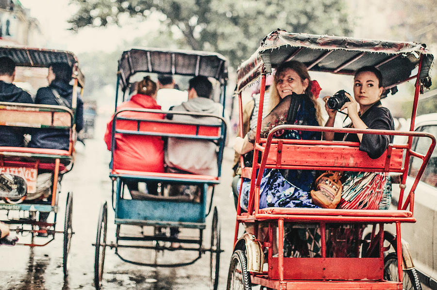 Tourists in a Rickshaw Photograph by Instants
