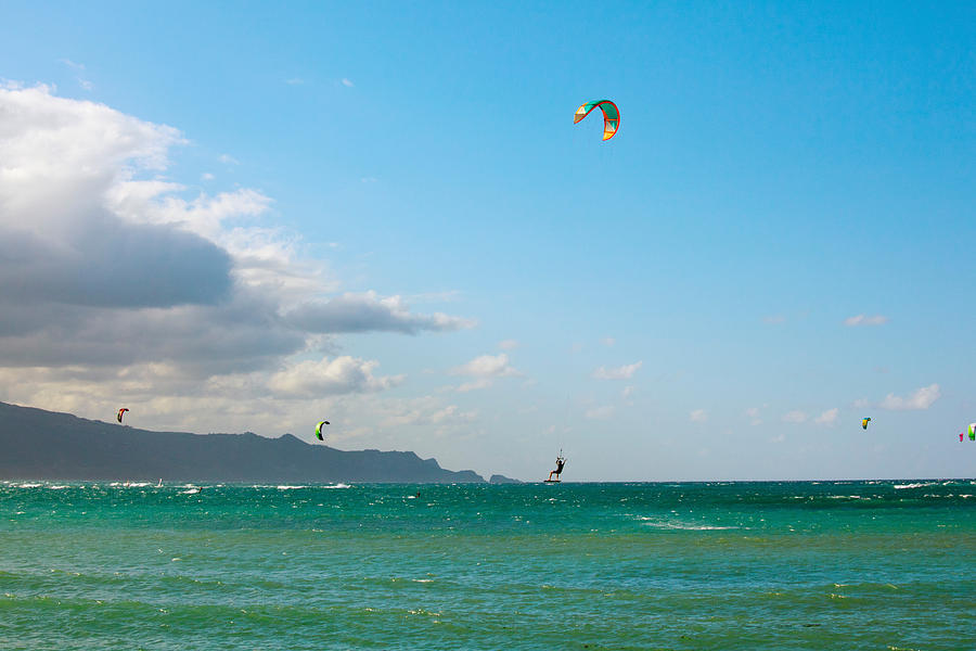 Nature Photograph - Tourists Kiteboarding In The Ocean by Panoramic Images