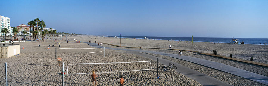 Tourists Playing Volleyball Photograph by Panoramic Images