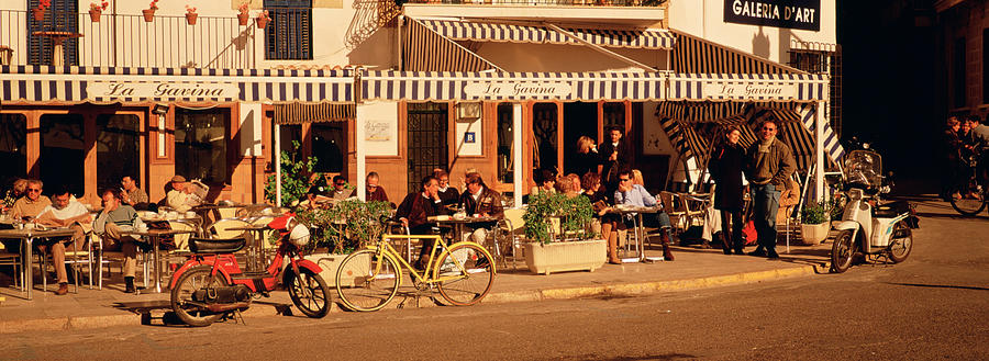 Transportation Photograph - Tourists Sitting In A Cafe, Sitges by Panoramic Images