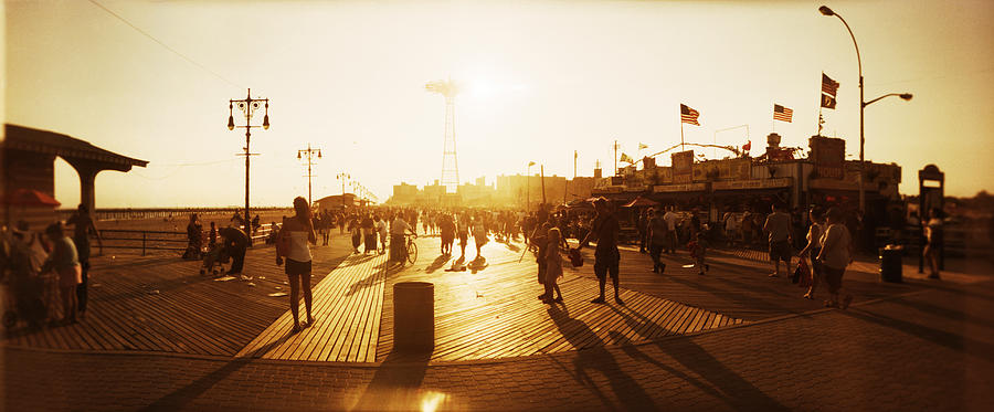 Tourists Walking On A Boardwalk, Coney Photograph by Panoramic Images