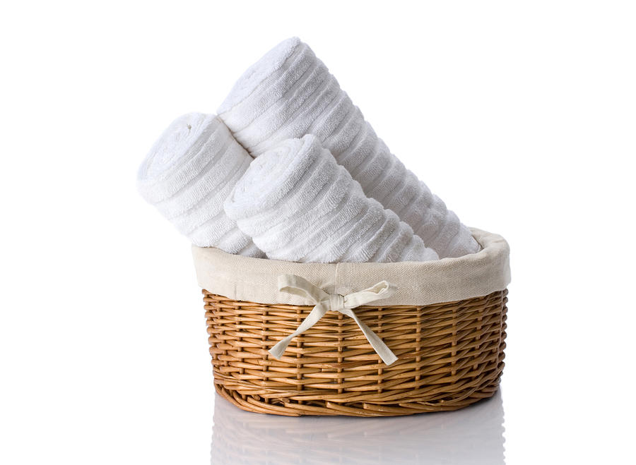 Towels In  Basket Photograph by Spiderstock