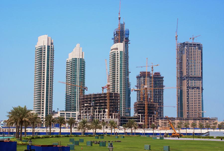 Crane Photograph - Tower Block Construction In Dubai by Mark Williamson