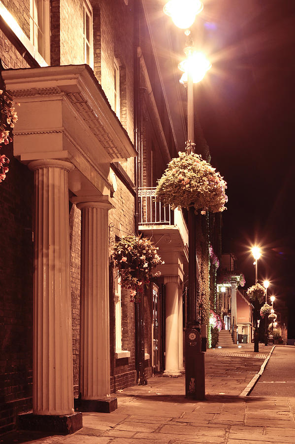 Architecture Photograph - Town at night by Tom Gowanlock