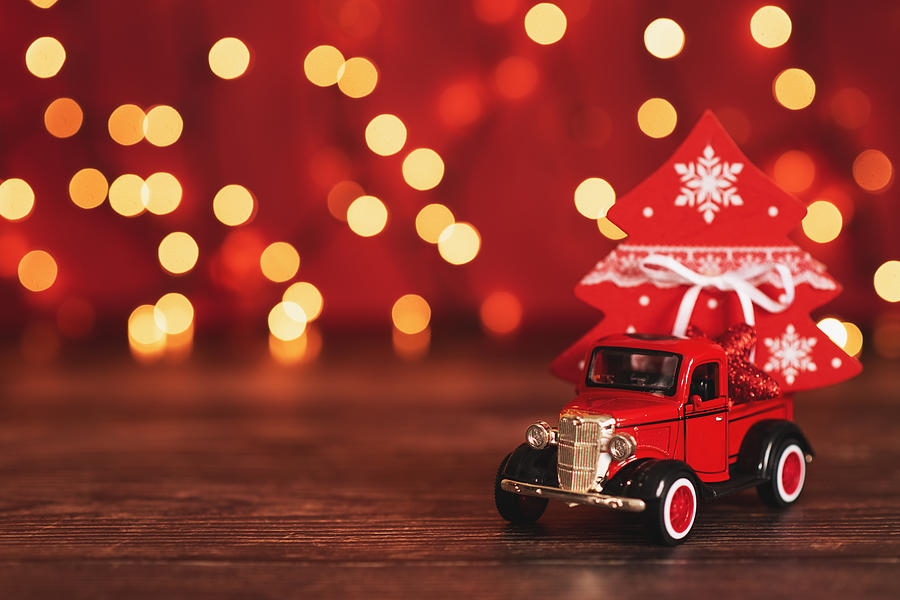 Toy car with Christmas tree Photograph by Kseniya Ovchinnikova