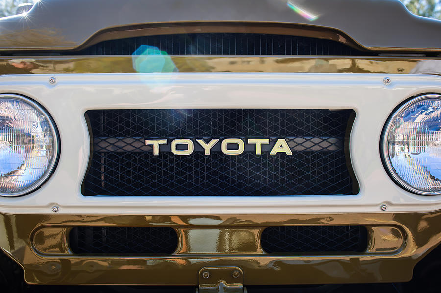 Car Photograph - Toyota Land Cruiser Grille Emblem  by Jill Reger