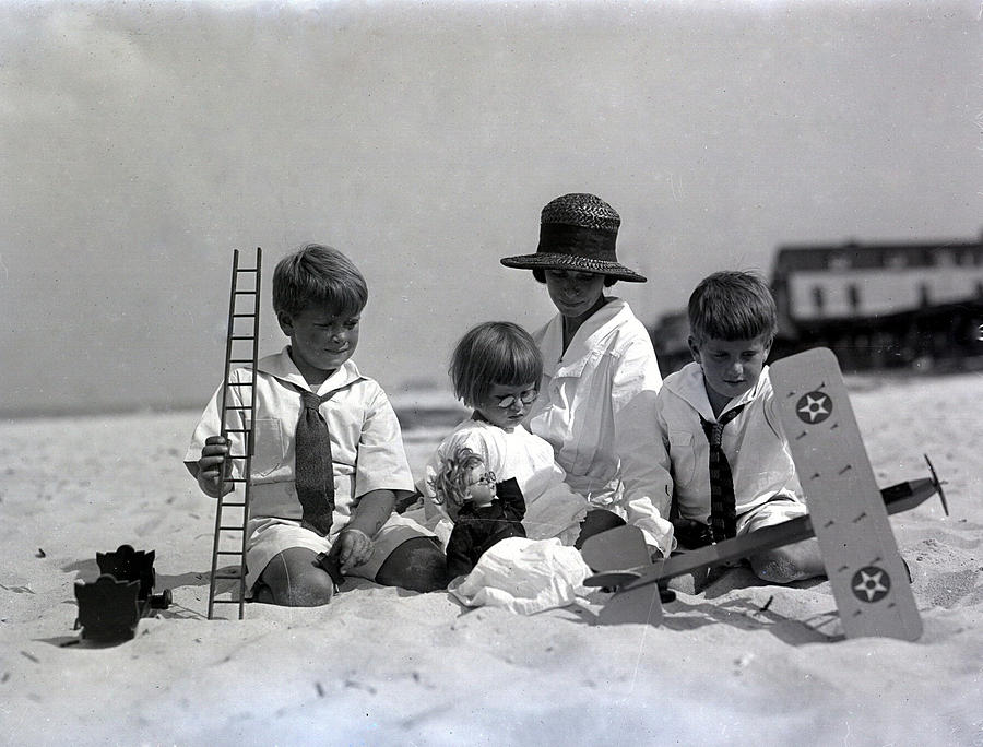 Toys On The Beach Photograph by William Haggart