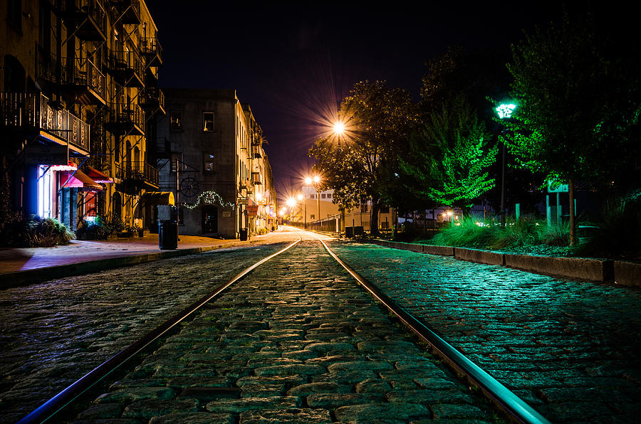 Tracks on the Riverwalk at Night Photograph by Anthony Doudt