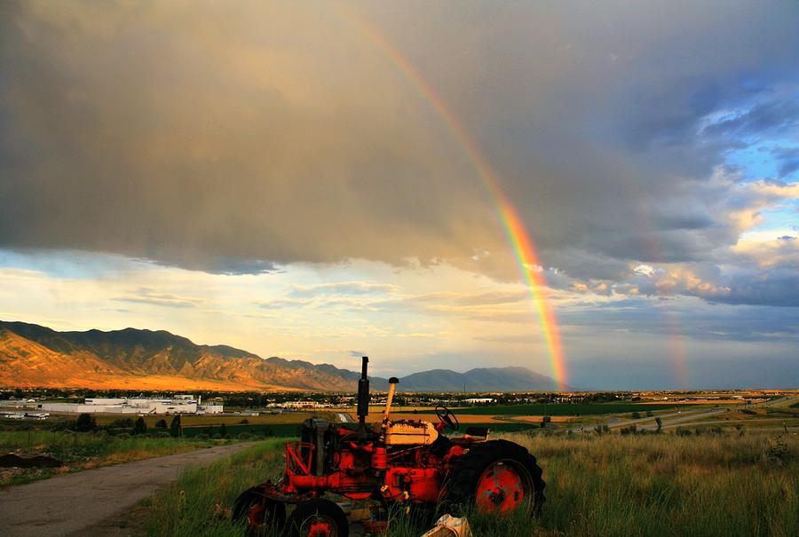 Mountain Photograph - Tractor and Rainbow Landscape by Goldie Pierce
