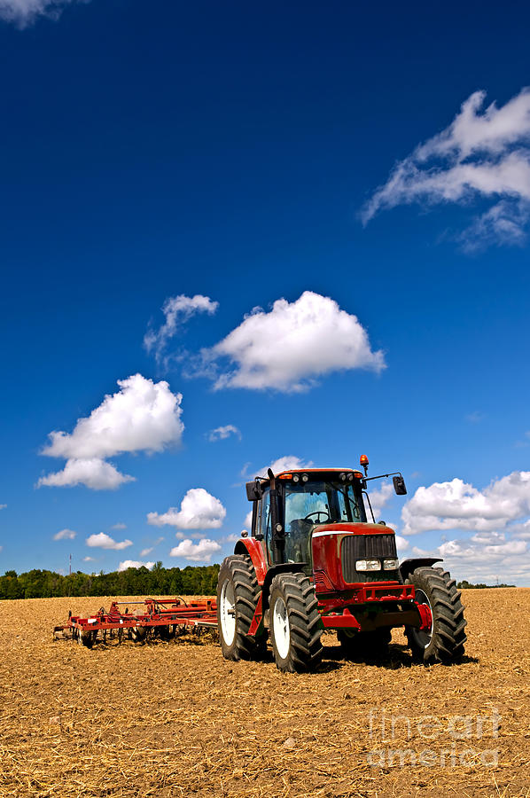Farm Photograph - Tractor in plowed field 2 by Elena Elisseeva