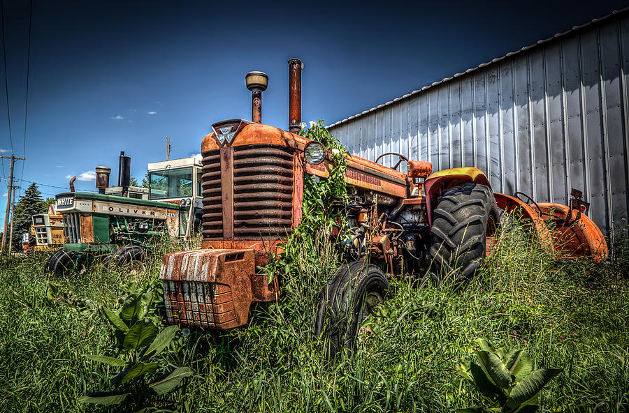 Tractors By The Road Photograph by Ray Congrove