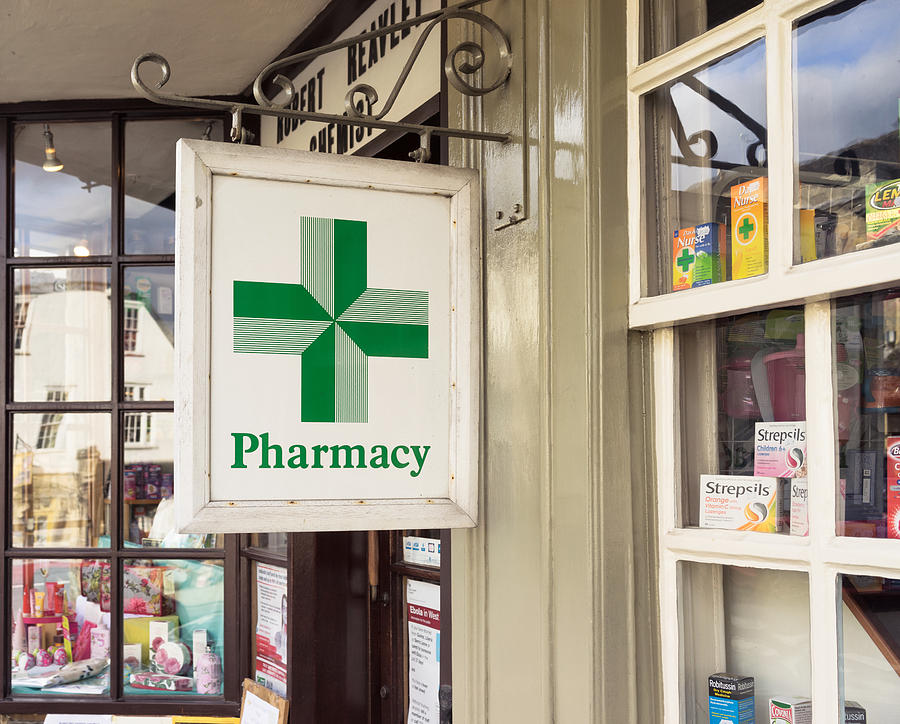 Traditional English pharmacy exterior Photograph by Georgeclerk
