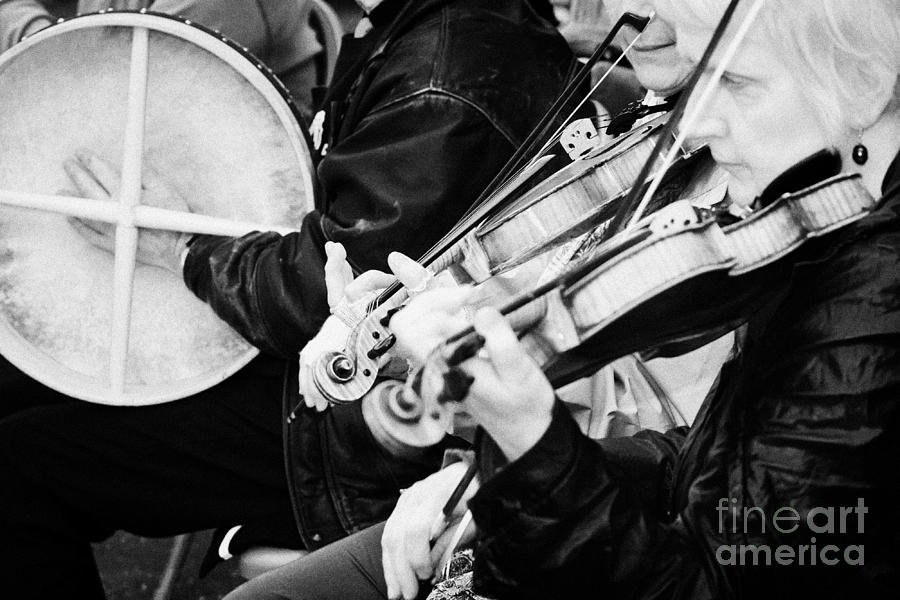 Musician Photograph - Traditional Irish Musicians Playing Outdoors At An Event by Joe Fox