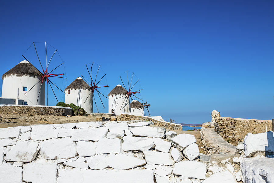 Traditional Windmills Of Mykonos Photograph by Deimagine