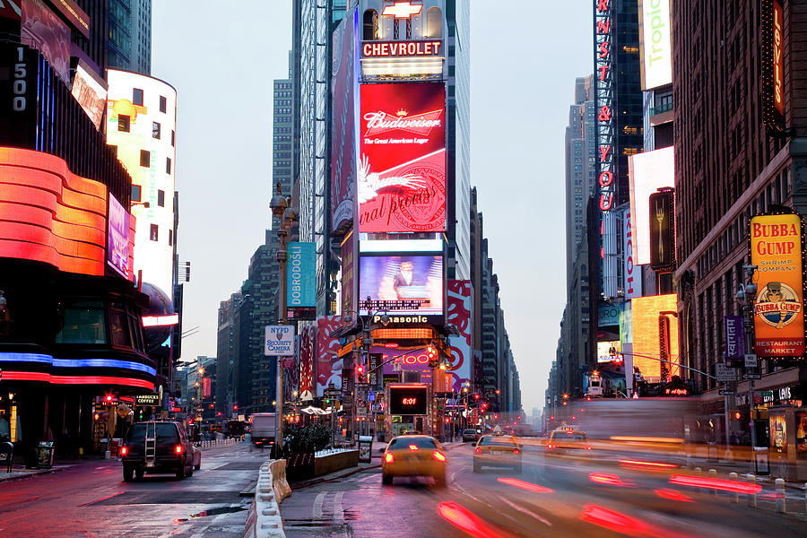 Traffic Driving Through Times Square At Photograph by Richard Ianson