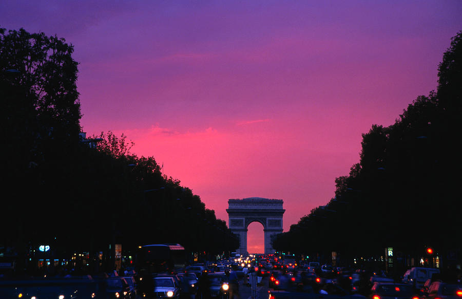 Traffic On The Champs-elysees And The Photograph by Izzet Keribar