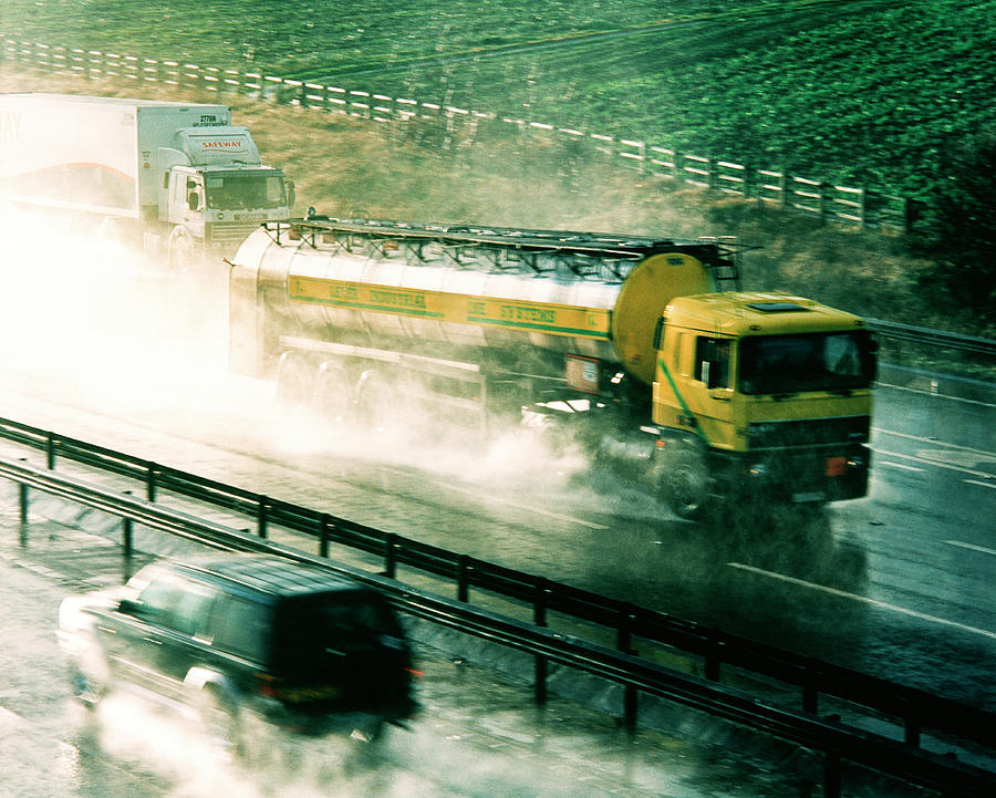 Truck Photograph - Traffic On Wet Motorway by Trl Ltd./science Photo Library