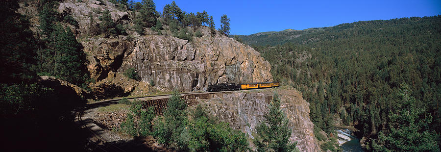 Train Moving On A Railroad Track Photograph by Panoramic Images