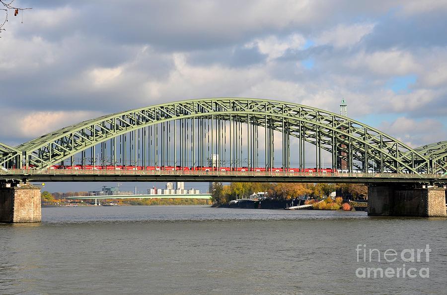 Train on bridge at Rhine River Cologne Germany Photograph by Imran Ahmed