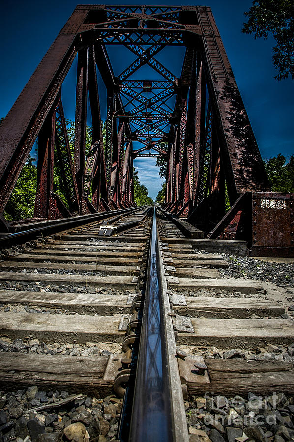 Train Trestle and Reflection in Rail Photograph by Ronald Grogan