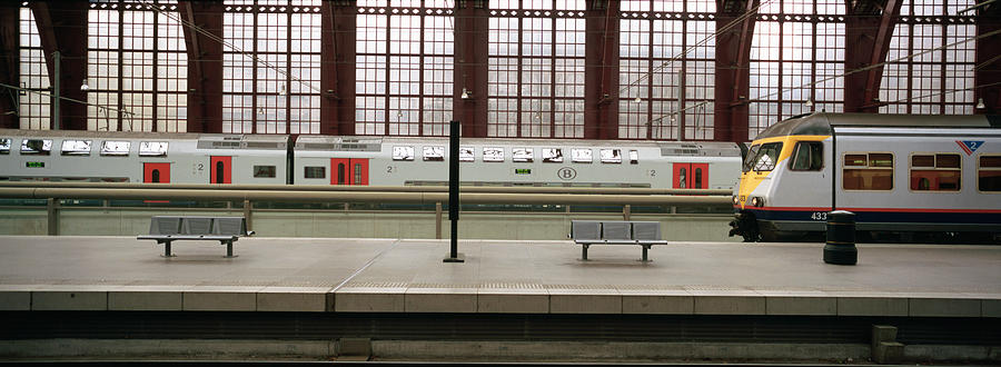 Transportation Photograph - Trains At A Railroad Station Platform by Panoramic Images