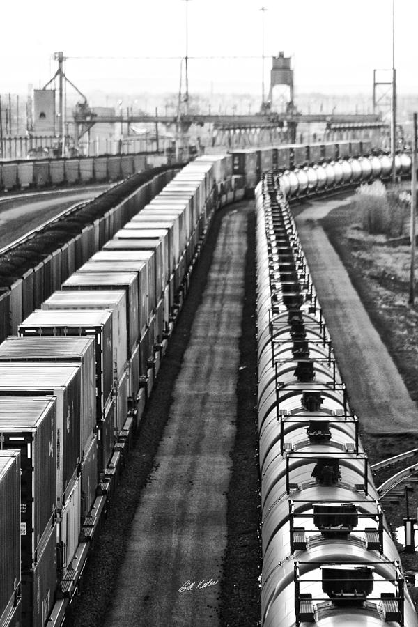 Black And White Photograph - Trains Stop For Servicing by Bill Kesler