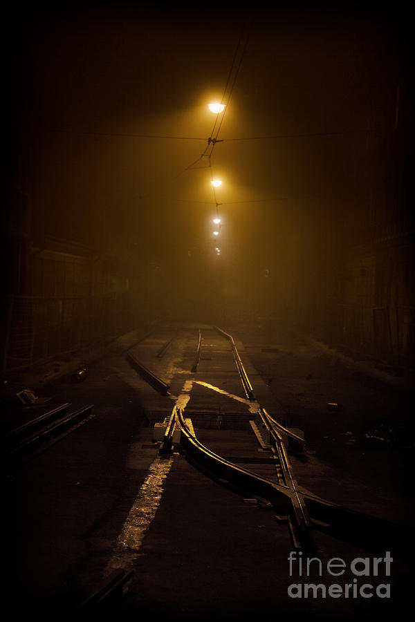 Tram rails at night Photograph by Jaroslaw Blaminsky