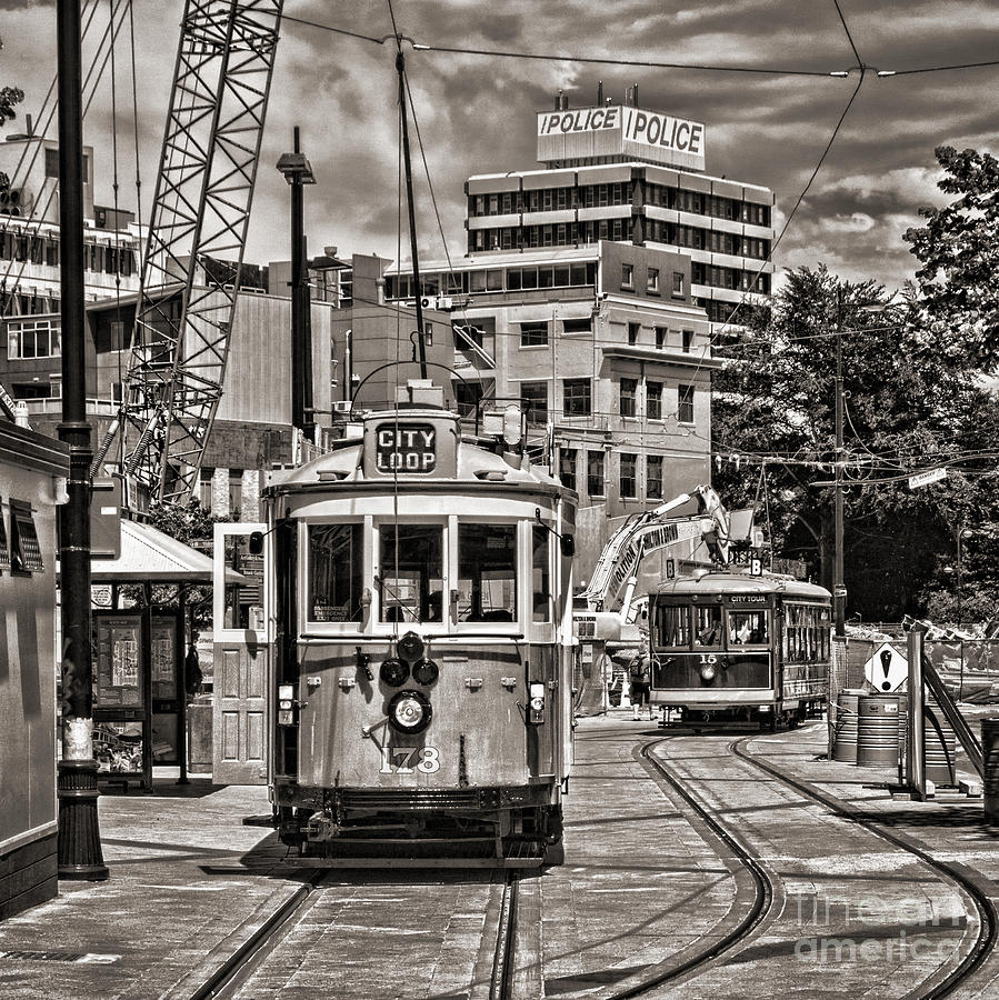 Trams in Cathedral Square Christchurch New Zealand Photograph by Colin and Linda McKie