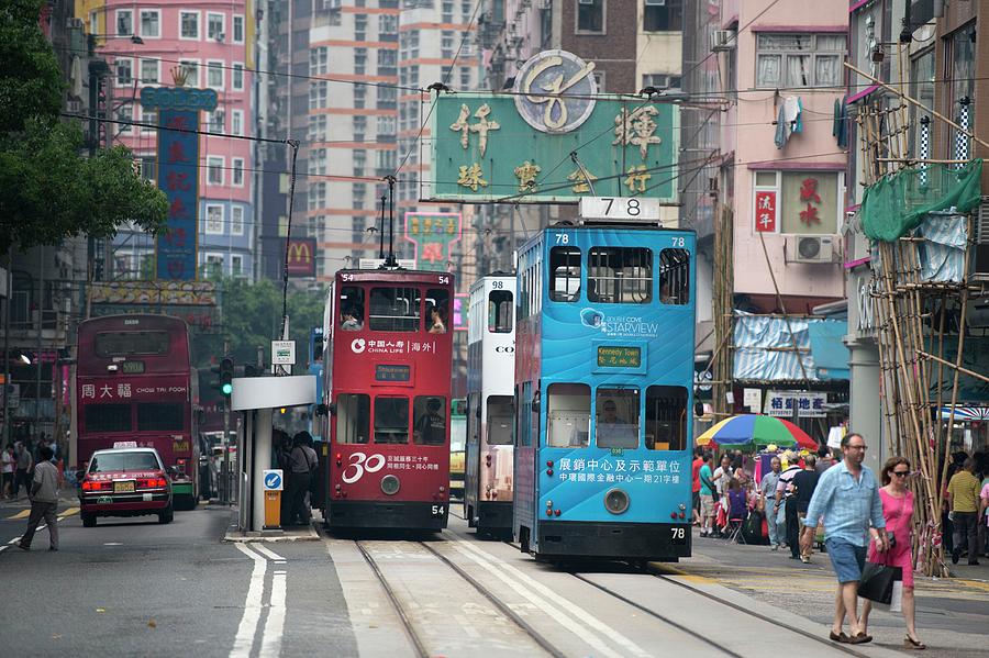 Trams In Hong Kong Photograph by Tony Camacho